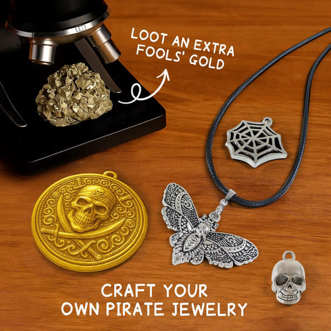 Pirate Treasure Dig Kit for Kids 6 and Up, Uncover 16 Plus Realistic Ancient Coin Replicas, Fool's Gold and Pirate Charms, STEM Archaeology Craft for Necklace Making, Coin Collecting Gift for Curious Explorers: pirate charms and necklace pieces on wood