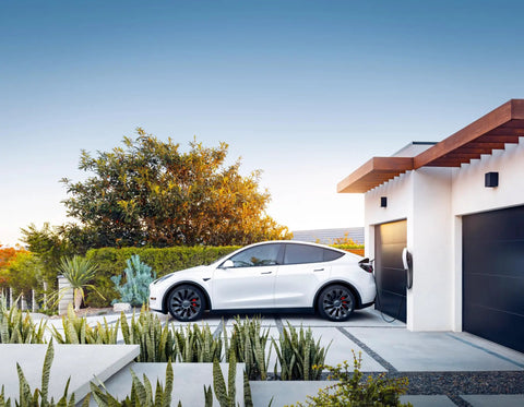 Tesla Wall Connector EV Charger For Home Use Level 2 NACS Up To 48 Amp 11.5 kW Output UL Certified Energy Star Partner installed outdoors.