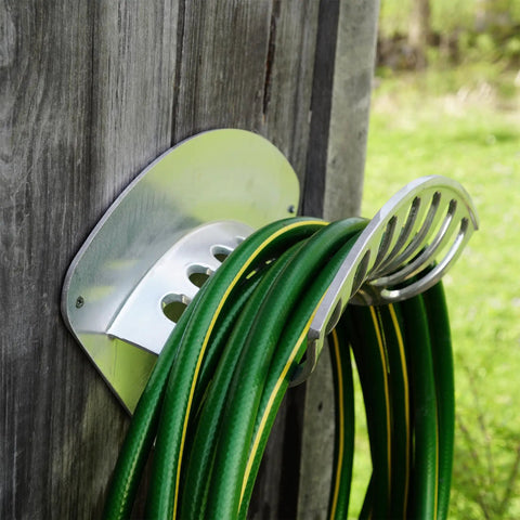 Heavy Duty Aluminum Hose Holder Wall Mount For Outdoor Gardens 200 Foot Reel For Half Inch Hoses mounted on exterior wall