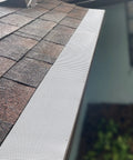 Installed Heavy Duty Stainless Steel Gutter Guard 48 Ft Universal Fit For 4 And 5 Inch Gutters Micro Mesh Leaves Screen White on rooftop