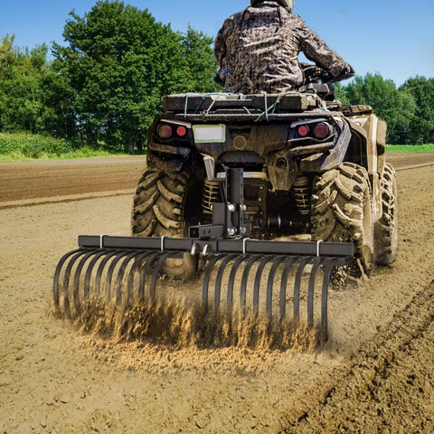 Workhorse Heavy Duty ATV UTV Landscape Rake Tool For Rock Grass Clumps And Debris Cleanup on dirt trail
