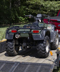 Heavy Duty 3/8 Inch Weather Resistant Rope Tightening Tie Down System With 15 Foot Orange Rope securing ATV on trailer