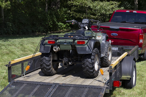 Heavy Duty 3/8 Inch Weather Resistant Rope Tightening Tie Down System With 15 Foot Orange Rope securing ATV on trailer