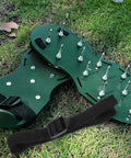 Lawn Aerator Shoes With Spikes 8 Pack Adjustable Garden Sandal Straps on grass, showing spikes and strap detail.