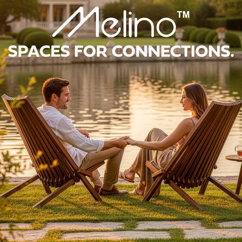 Couple sitting on 2 Pack Folding Acacia Wood Chair Set For Patio And Outdoors, Low Profile Lounge Seats with Chestnut Finish by lake.