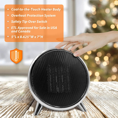 Hand adjusting Vintage Inspired Ceramic Space Heater That Cranks Up The Warmth Fast, 1500W Portable Desktop Electric Heater, Black