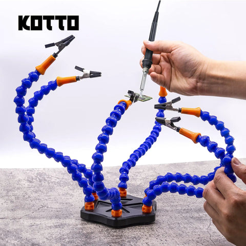 Six Arm Third Hand Soldering Station with non slip aluminum base holding a circuit board.
