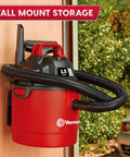 Pro Grade 2.5 Gallon Wet Dry Shop Vac Featuring Wall Mount Storage And Killer Suction Motor For Rapid Garage Sweeps Durable Carry Handle Design In Fiery Red mounted on wall.
