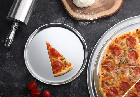 Pepperoni pizza slice on Pro Grade Restaurant Aluminum Pizza Pan 14-Inch Coupe Style Baking Tray, highlighting even heat.