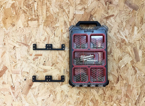 Dope Cleat And Feet Cleats Six Pack For Tool Box Storage System next to Milwaukee Packout case on wooden surface