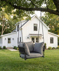 Single Seater Porch Swing Chair With 106 Inch Adjustable Rope For Height Boho Macrame Hanging Hammock Chair in grey, outdoor view