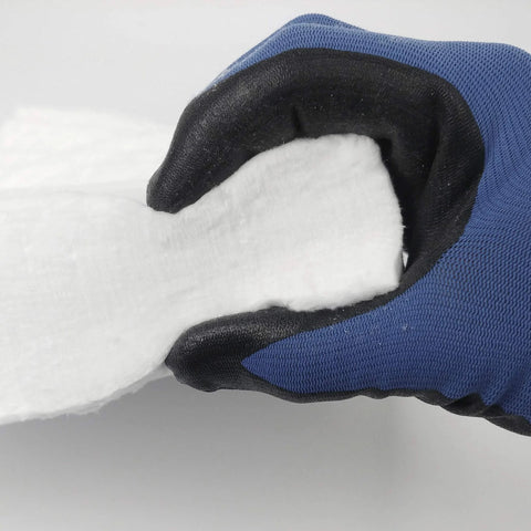 Ceramic fiber insulation blanket, 2 in thick x 15 in x 24 in, blue fabric cover with white fibrous interior.