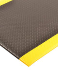 Corner view of Diamond Sof-Tred Anti Fatigue Mat With Dyna Shield For Home Or Business 3 Foot By 12 Foot Beveled Edges Black Yellow Durable Cushioning