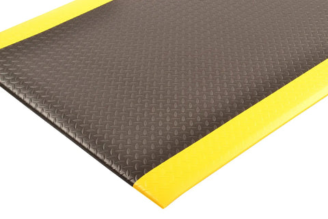 Corner view of Diamond Sof-Tred Anti Fatigue Mat With Dyna Shield For Home Or Business 3 Foot By 12 Foot Beveled Edges Black Yellow Durable Cushioning