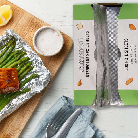 Premium Aluminum Foil Sheets 9 By 10.75 Inches, 1000 Sheets, Pop Up Dispenser, shown with grilled food on countertop