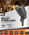 Bronze 12W Outdoor LED Flood Light Weatherproof Exterior Fixture With Adjustable Mounting Bracket Energy Efficient Yard Garden Landscape Lighting For Bright Nighttime Visibility And Security in front of illuminated house backdrop.