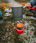 Reactor Windproof Camping Stove System with 1.0L pot in use on backcountry terrain 2024 Version.