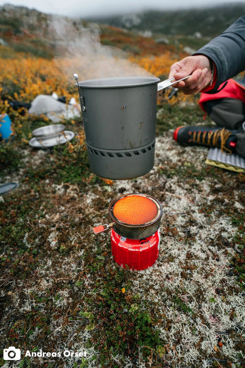 Reactor Windproof Camping Stove System with 1.0L pot in use on backcountry terrain 2024 Version.