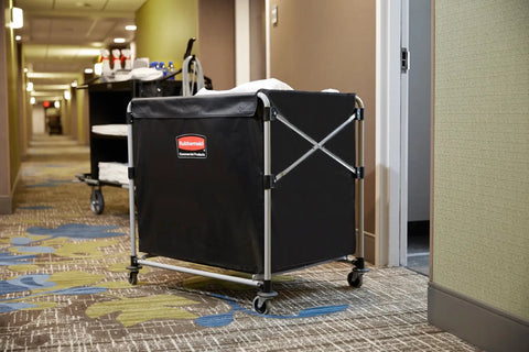 Collapsible X Cart with Wheels 8 Bushel Steel Laundry Cart Heavy Duty Black Utility Cart in hotel hallway