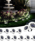 8 Pack Solar Ground Lights Outdoor Waterproof With 8 LED Solar Powered Landscape Lighting illuminating a garden pathway at night