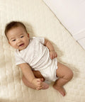Spillproof Waterproof Crib And Toddler Mattress Protector With Quilted Organic Cotton Top Layer Ultra Soft Fitted Pad Cover 52x28