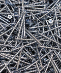 Top Shelf Phillips Bugle Head Screws Number Eight By Two And A Half Inches Coarse Drywall Or Wood Fasteners Featuring Sweet Zinc Finish Heavy Duty Bulk Pack, zinc-coated screws in a pile.