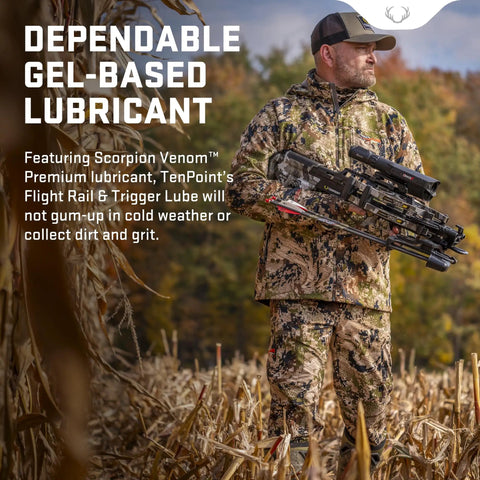 Man in camo holding crossbow using Crossbow Flight Rail And Trigger Lube For Cocking Cords Strings Cables Barrels And Trigger Mechanisms Petroleum Based Lubricant That Stays Gunk Free In Cold Weather For Smooth Operation And Tight Accuracy