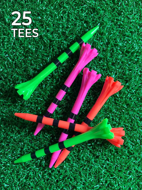 Colorful 3.25in golf tees, citrus mix with black stripes, in grass. 25 count durable high-grade plastic for drivers over 360cc.