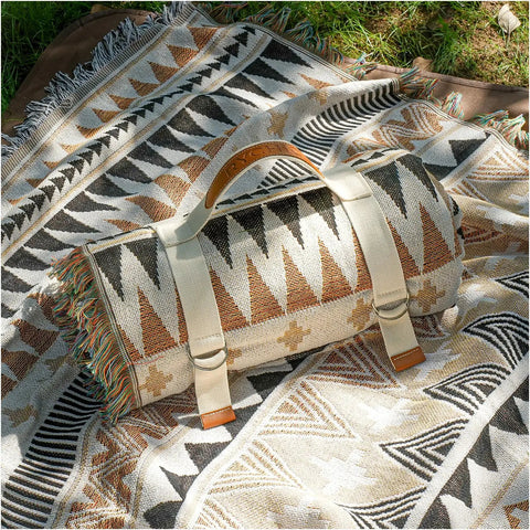2 In 1 Extra Large Boho Beach Blanket Towel Giant Woven Outdoor Picnic Mat For Camping And Travel folded on grass