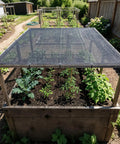50 Percent Shade Cloth 8 Ft By 16 Ft Sun Shade Netting With Durable HDPE Material And Heavy Duty Grommets Covering Garden Bed