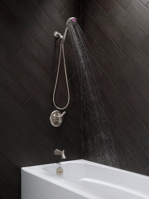 Bathroom setup with Stainless Lahara Pull-Up Diverter Tub Spout Replacement Part RP51303SS 0.5 Inch visible under showerhead.