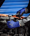 Person using wrench while wearing Level 5 Cut Resistant Work Gloves With Nitrile Palm Grip For Dry To Oily Surfaces