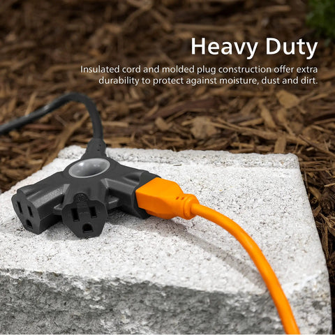 EZGrip 25 Ft Heavy Duty Outdoor Extension Cord With Multiple Outlets, grounded 3 prong, shown on outdoor stone surface