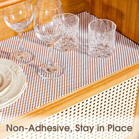 Top Shelf Nonslip Shelf Liner For Kitchen Cabinets And Drawers, White Non Adhesive Mat, Slick Anti Shift Grip, No Fuss Pantry Organizer, Game Changer Home Storage, 12 X 120 Inches featuring glasses on non-slip liner.