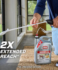 Indoor Insect Killer Spray With Wand Builds A Tough Shield Against Roaches, Ants, Spiders, Ticks And Fleas Ready To Use 1 Gallon with extended reach wand in use.