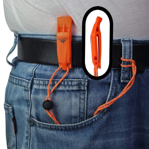 Person with ultra loud double chamber emergency whistle clipped to jeans, orange lanyard, pealess design, for outdoor adventures