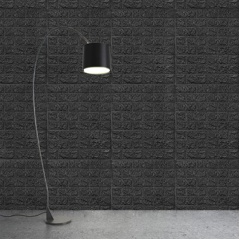 Black Faux Brick Peel And Stick Wall Panels For Living Room with floor lamp, waterproof foam, DIY installation, acoustic coverage.