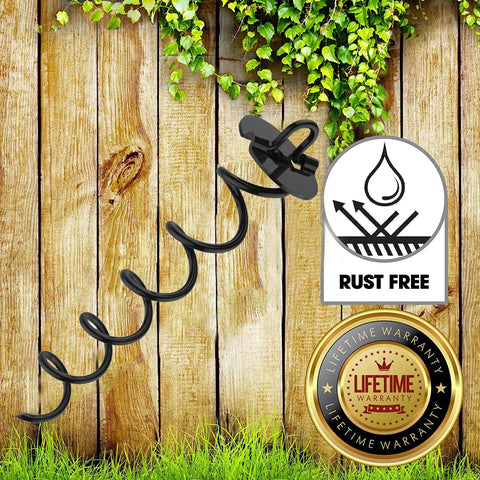 Four Piece Spiral Stakes Beefy Heavy Duty Ice Screw Anchors For Trampolines Tents Tarps Canopies on grass with warranty badge