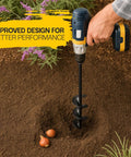 Sproot garden auger drill bit for planting, 1.6x16.5 in, attached to cordless drill drilling into soil