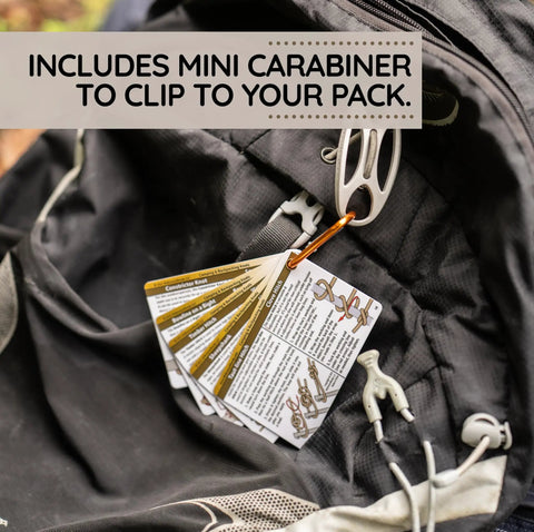 Outdoor Knot Cards 22 Knots For Camping Backpacking And Scouts clipped to backpack with carabiner