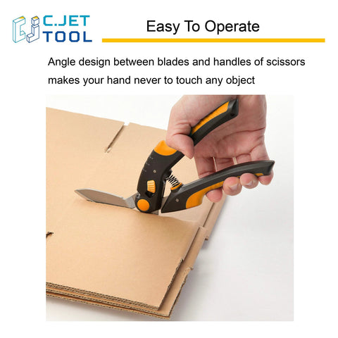 C.JET TOOL 10-inch heavy-duty scissors with orange/black soft-grip handles cutting cardboard; side view.