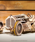 3D Wooden Puzzle Car Kit Inspired By Classic Grand Prix Racer With A Fully Functional V8 Engine, Ultra Detailed U9 Style Mechanical Model You Build And Enjoy, A Hands On Racing Car Project For Adults And Teens front view, natural wood