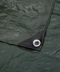 Close-up of a dark green Waterproof Multipurpose Camping Tarp with Tear-Resistant Build and Reinforced Edges showing grommet detail.