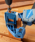 3/8 Inch Doweling Jig Kit With Drill Bit And Stop Collar in use on wooden board with dual edge stops