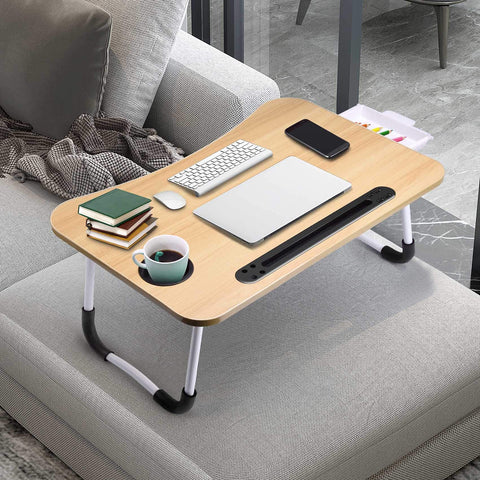 Foldable Laptop Desk For Bed Or Couch, Portable with Drawer, showing use on sofa as a breakfast tray and study table, brown MDF