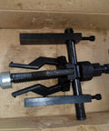 Beefy 3 Jaw Pilot Bearing Puller Bushing Extractor Tool for bikes motorcycles and cars with forged steel jaws in packaging