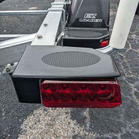 Right Side Waterproof LED Tail Light for Boat Trailer Updated 2025 Model, 7.5 By 3.5 Inches, mounted on EZ Loader trailer