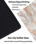 Rose Gold Marble Desk Pad For Mega Size 31.5 By 15.75 Inch Setup with delicate edge stitching and non-slip rubber base