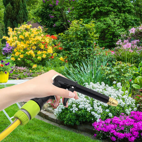 Person using Garden Quick Connect Water Connector Set Half Inch Hose Pipe Repair And Irrigation 4 Pack Durable ABS in garden