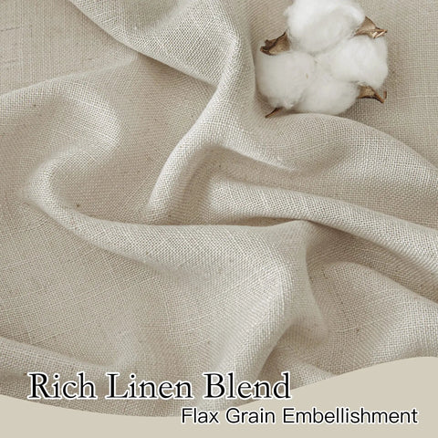 Close-up of rich linen blend fabric with flax grain embellishment, showcasing textile texture and quality with cotton bolls.